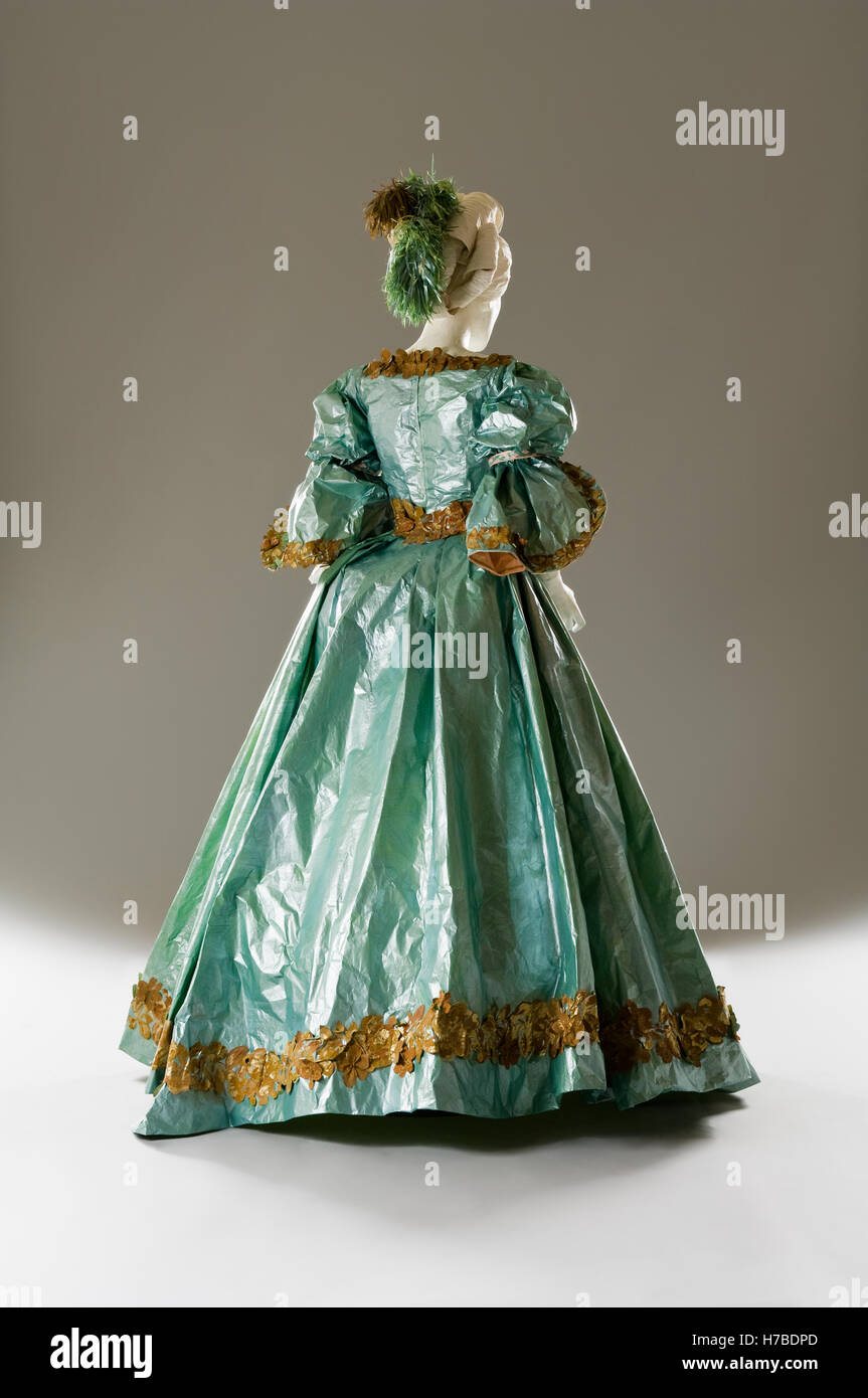 Full length turquoise dress with foliate borders, historical replica paper garment by Isabelle de Borchgrave Stock Photo