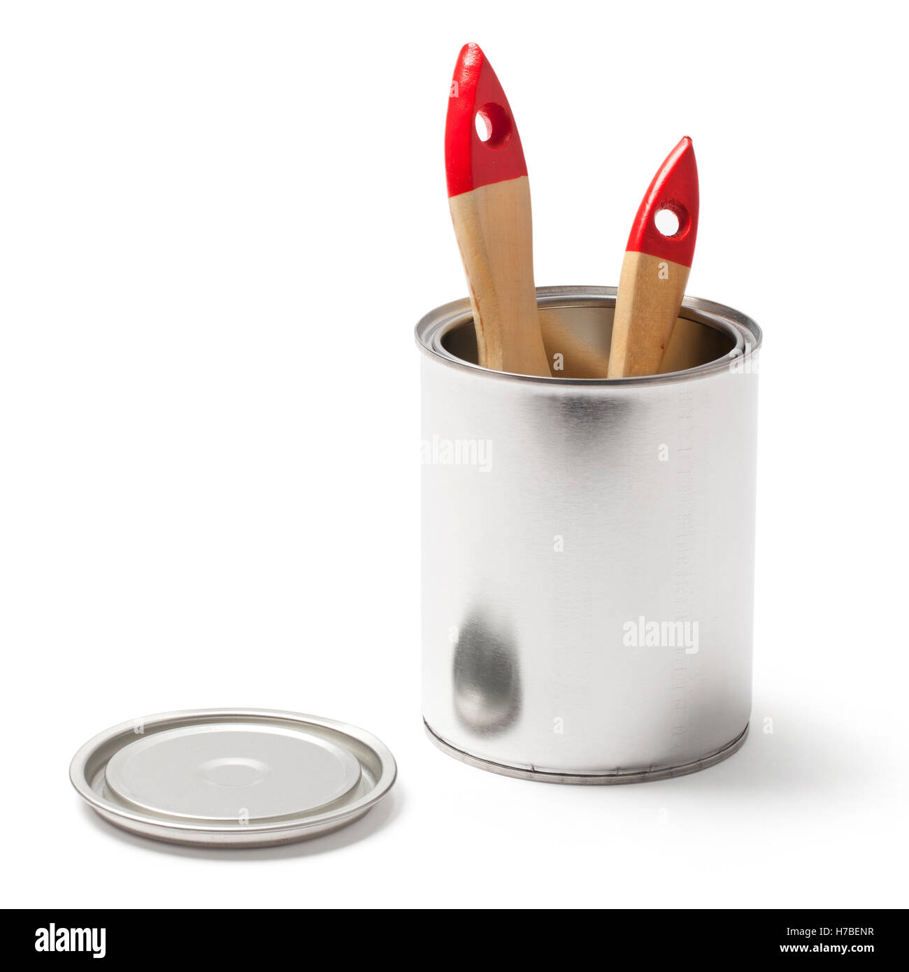 Open blank metallic paint can and two brushes with clipping path isolated on white. Stock Photo