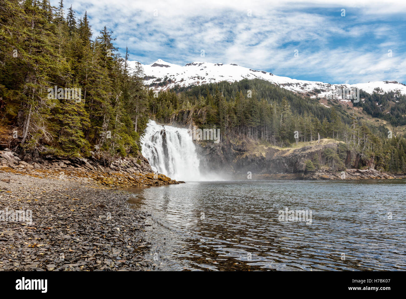 Large waterfall empties into Cascade Bay in Prince William Sound in Southcentral Alaska. Stock Photo