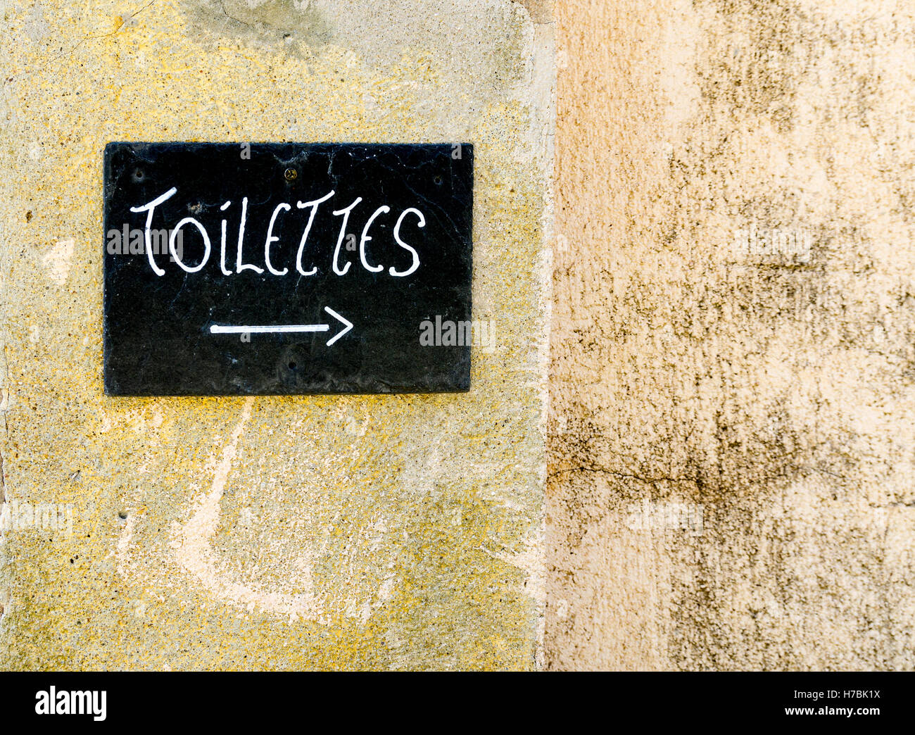 Blackboard type handwritten sign indicating toilettes in French Stock Photo Alamy