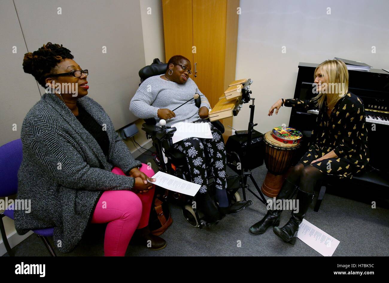 Radio DJ Jo Whiley takes part in a music session at the Nordoff Robbins Music Therapy unit during a visit to the BRITS school in Croydon, London. Stock Photo