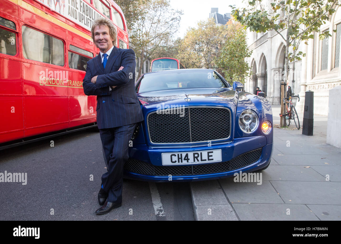 Managing Director of Pimlico Plumbers,Charlie Mullins,by his Bentley after the judges gave their verdict on the Brexit case Stock Photo