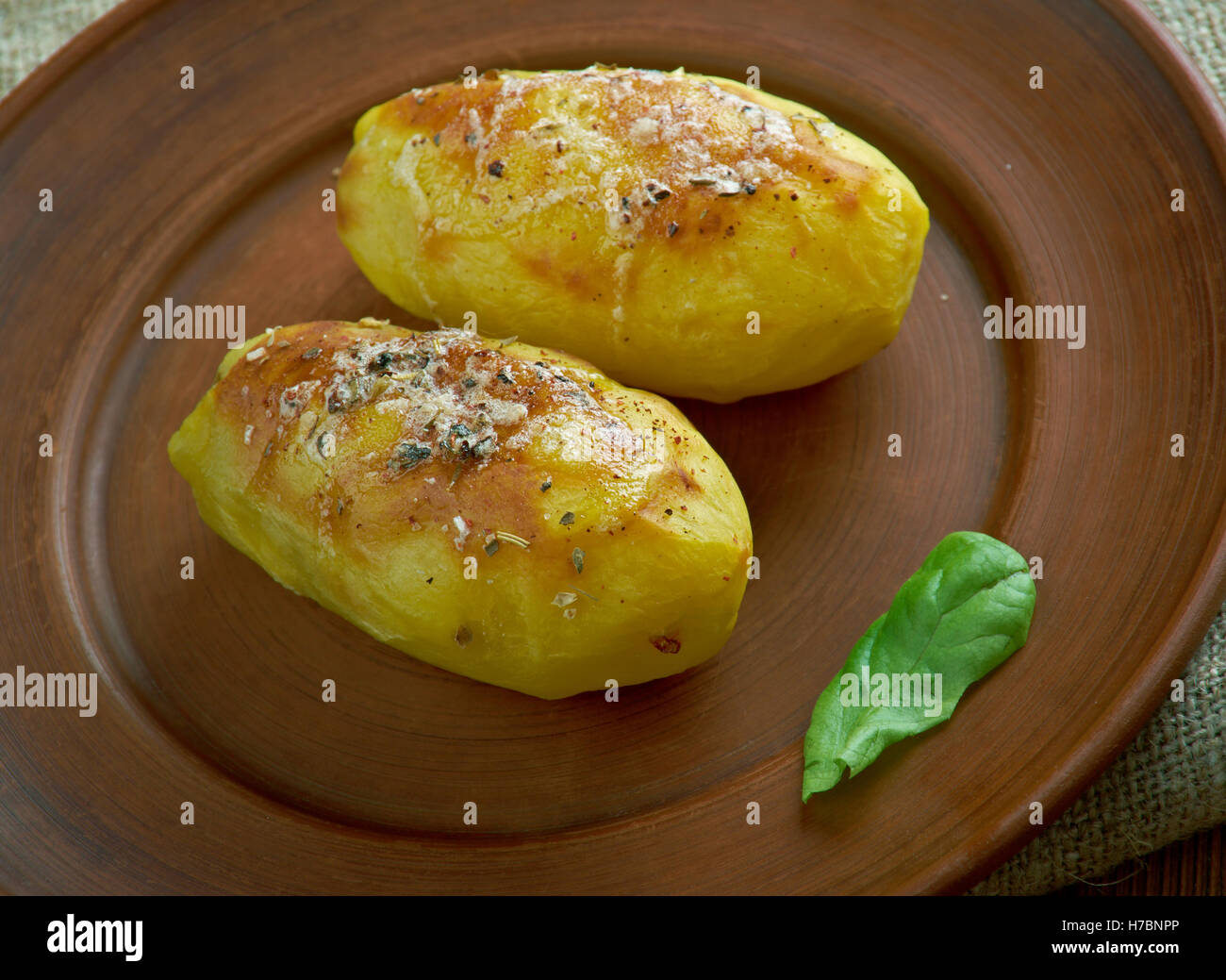 Kartofle pieczone .Baked potatoes in the Polish style Stock Photo Alamy