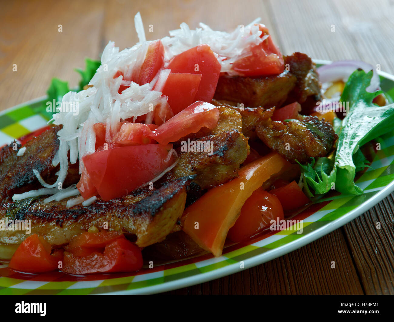 Puntas де filete regional Mexican dish is made filet of beef, y with the use of green serrano chiles Stock Photo