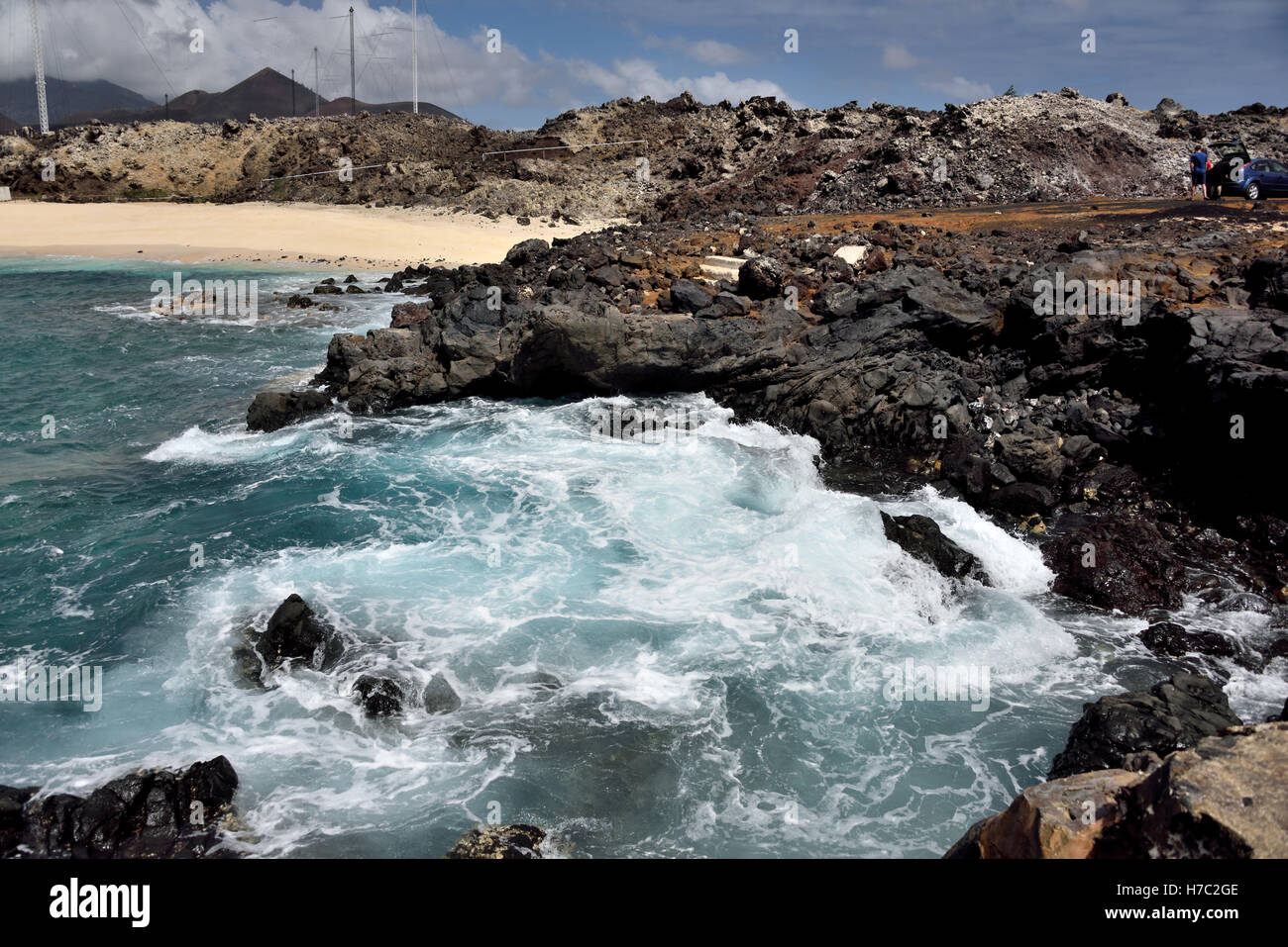 The rocky headland at the Western end of English Bay, one of only two safe swimming beaches on Ascension Island Stock Photo