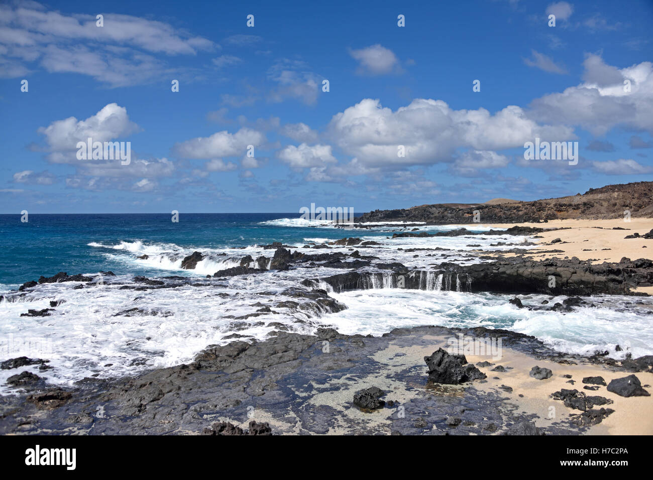 The sea appears to be boiling at Hummock Point on the North East coast of Ascension Island Stock Photo