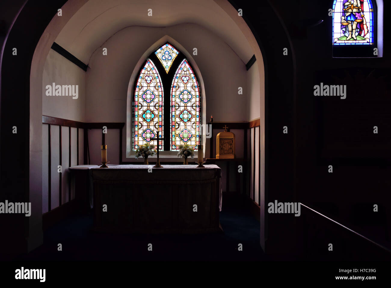 The altar and stained glass window in St Mary's church in on