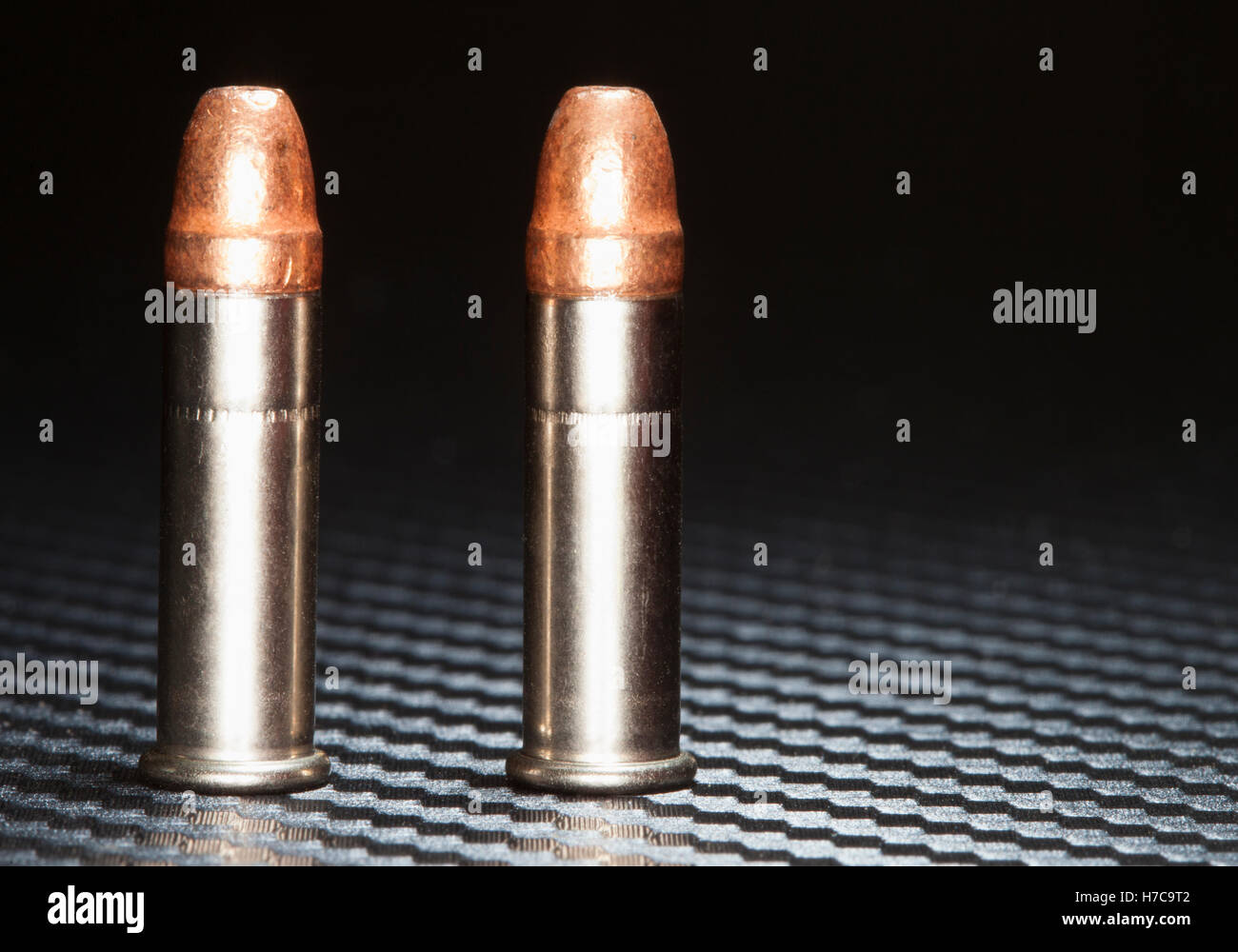Ammunition with copper plated bullets for rim fire guns Stock Photo