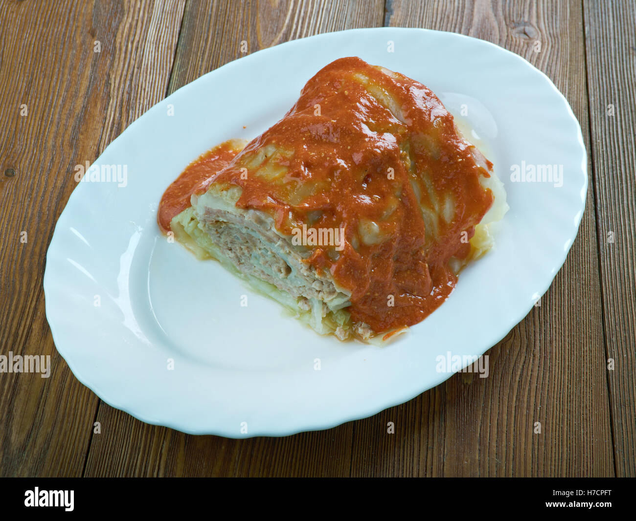 Roll out a leaves of cabbage and minced meat. Cabbage roll,Belarusian cuisine Stock Photo
