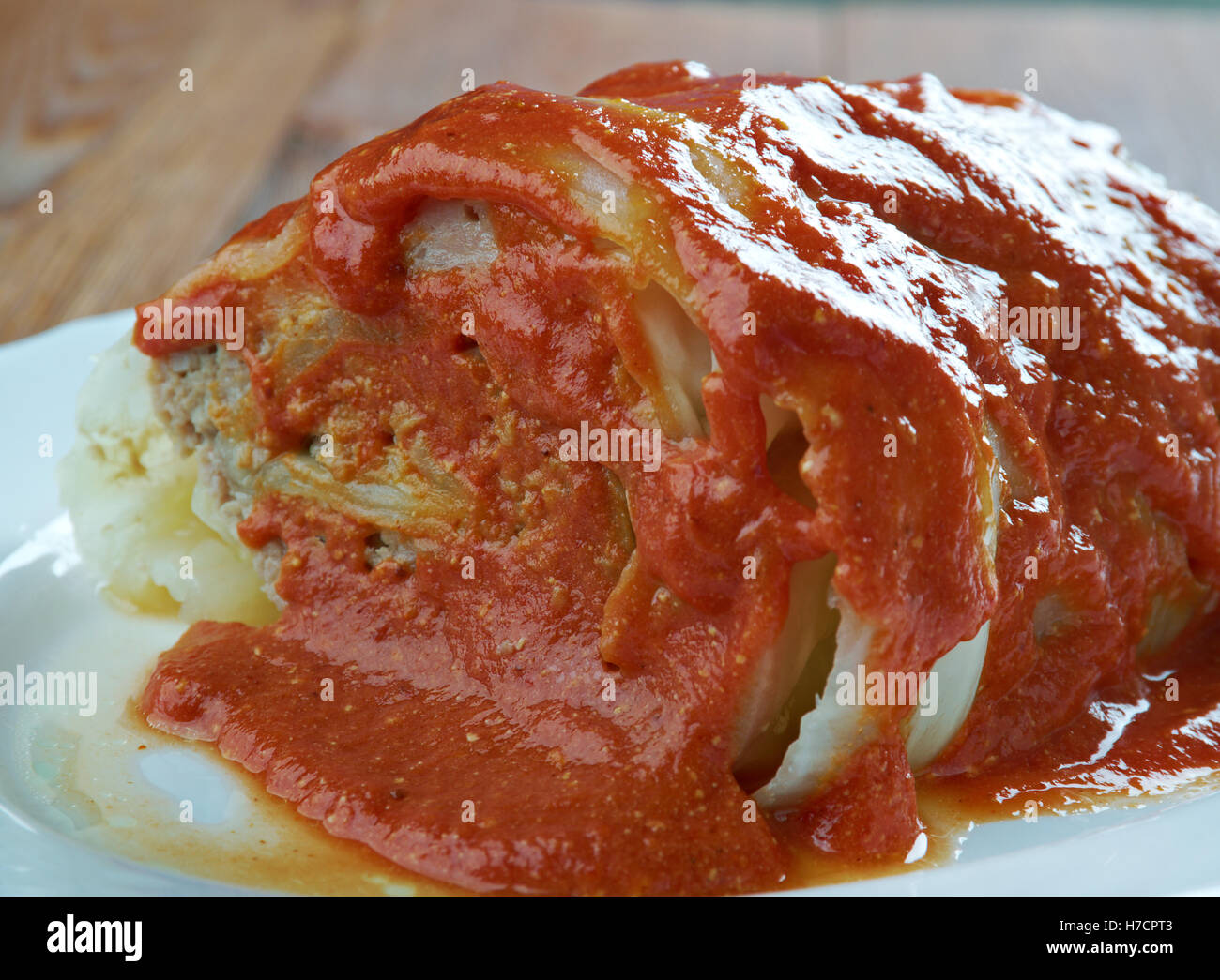 Roll out a leaves of cabbage and minced meat. Cabbage roll,Belarusian cuisine Stock Photo