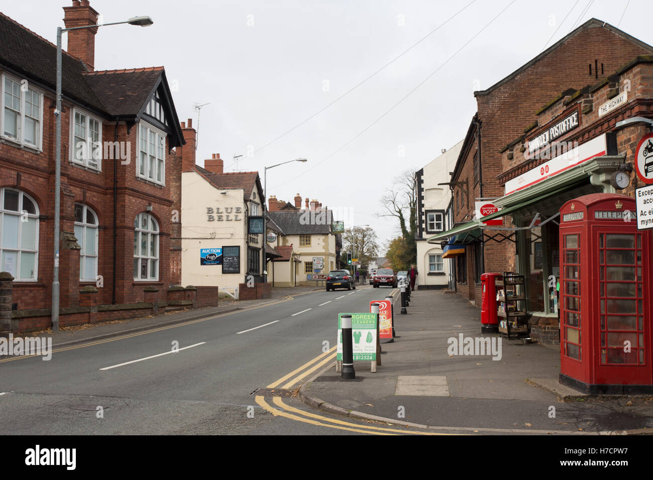 A view of the main street in the village of Hawarden showing the post