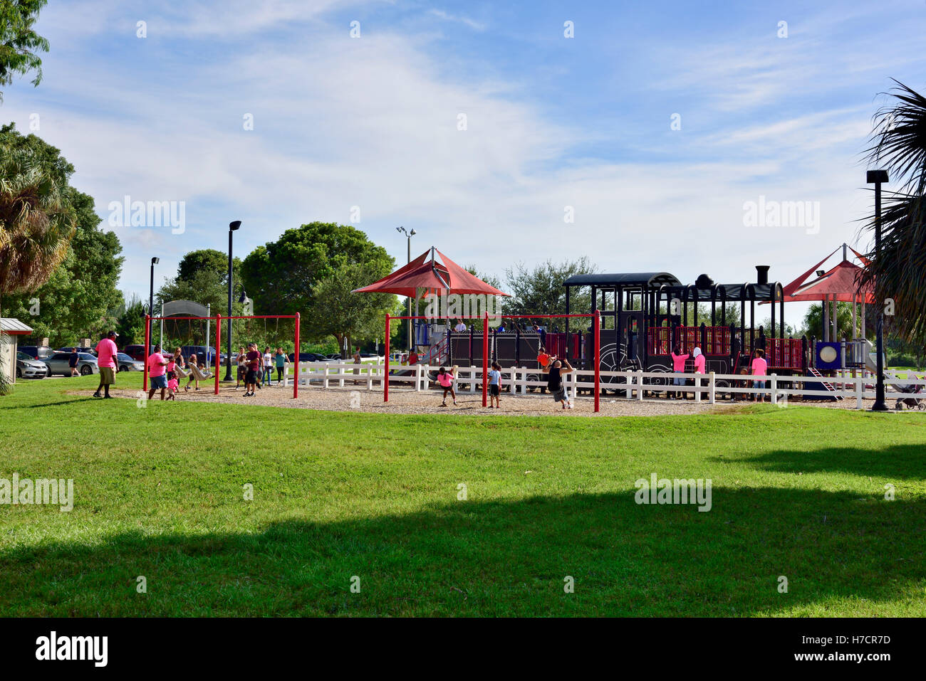 Children's play area and train ride part of Lee County, Lakes Regional Park, Fort Myers, Florida Stock Photo