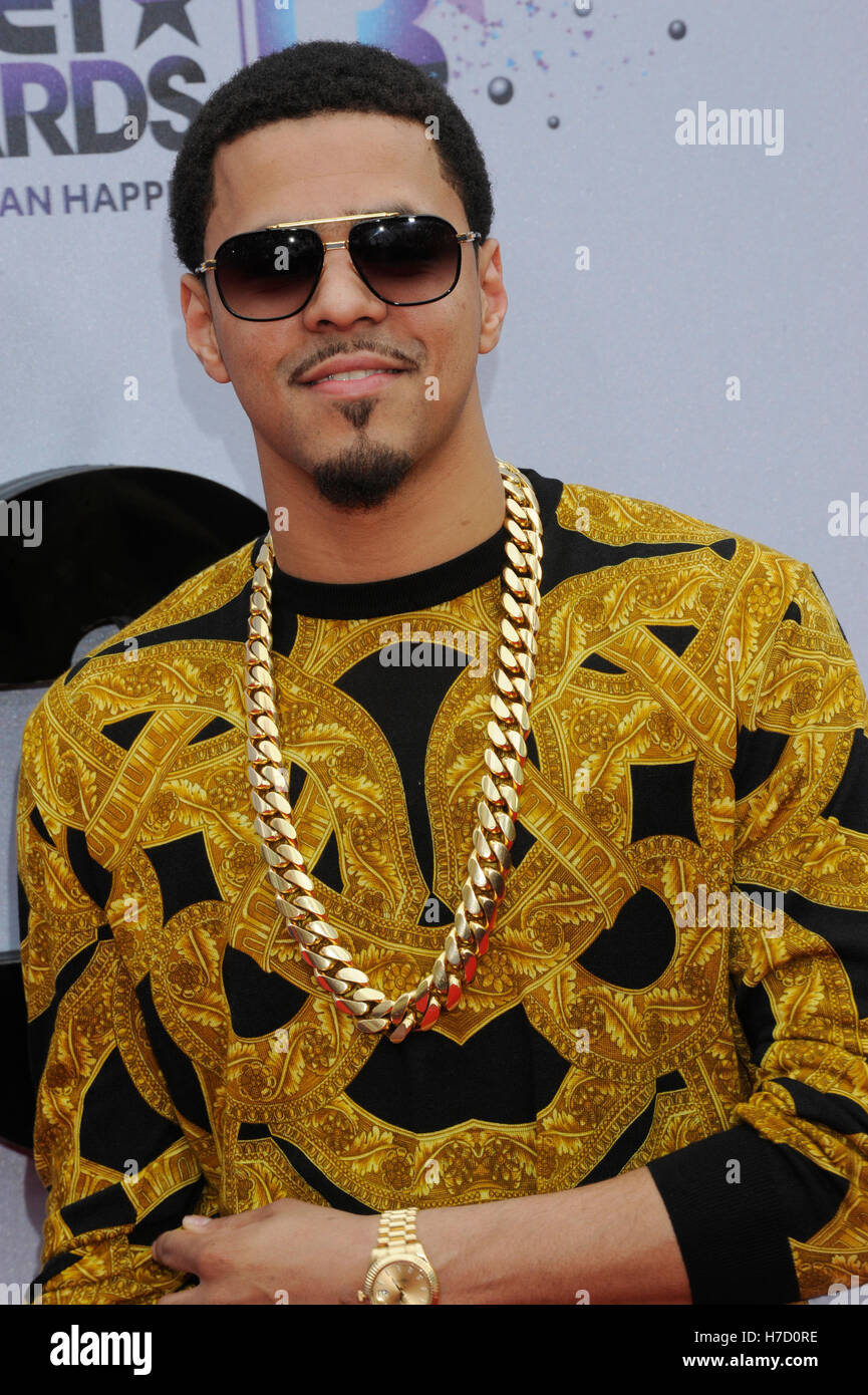 rapper j cole attends the ford red carpet at the 2013 bet awards at H7D0RE