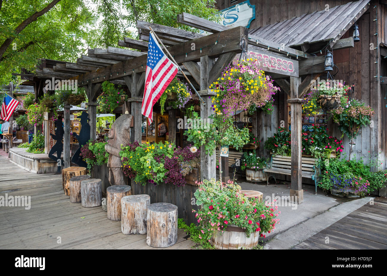 An American flag in front of a sweet shop in small town Winthrop, Washington, USA. Stock Photo