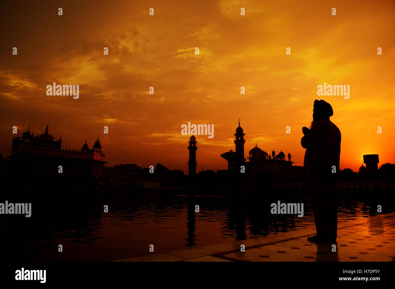 Sikh prayer at golden temple, Amritsar Stock Photo