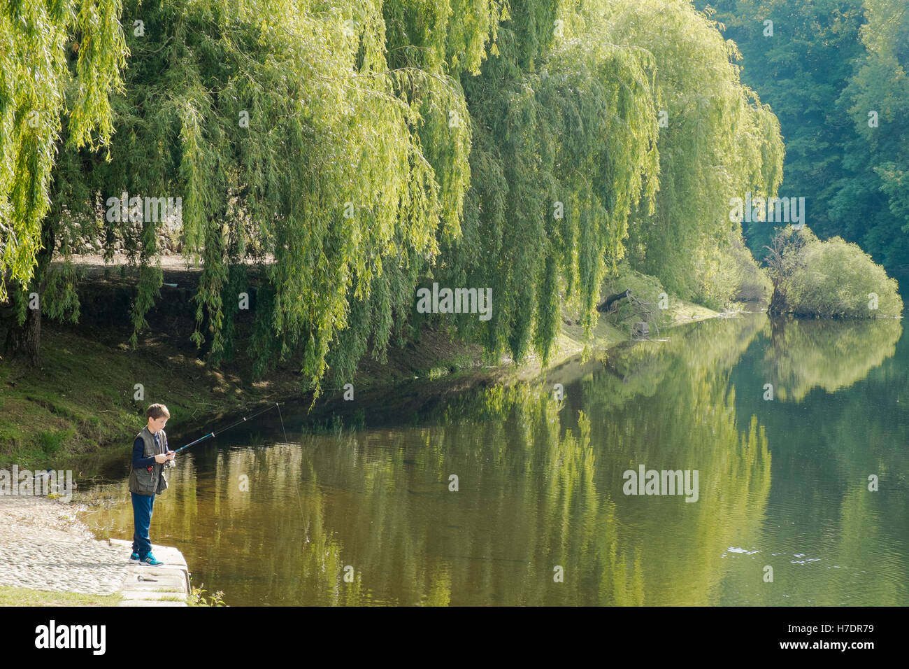 Boy fishing river hi-res stock photography and images - Alamy
