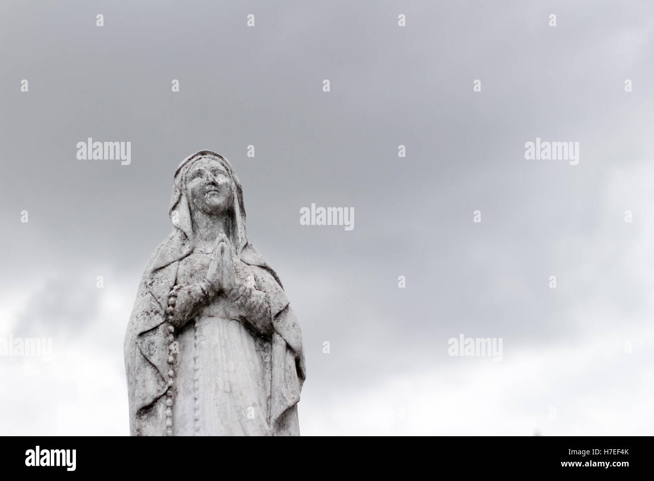 Photograph of a Virgin Mary stone statue Stock Photo Alamy