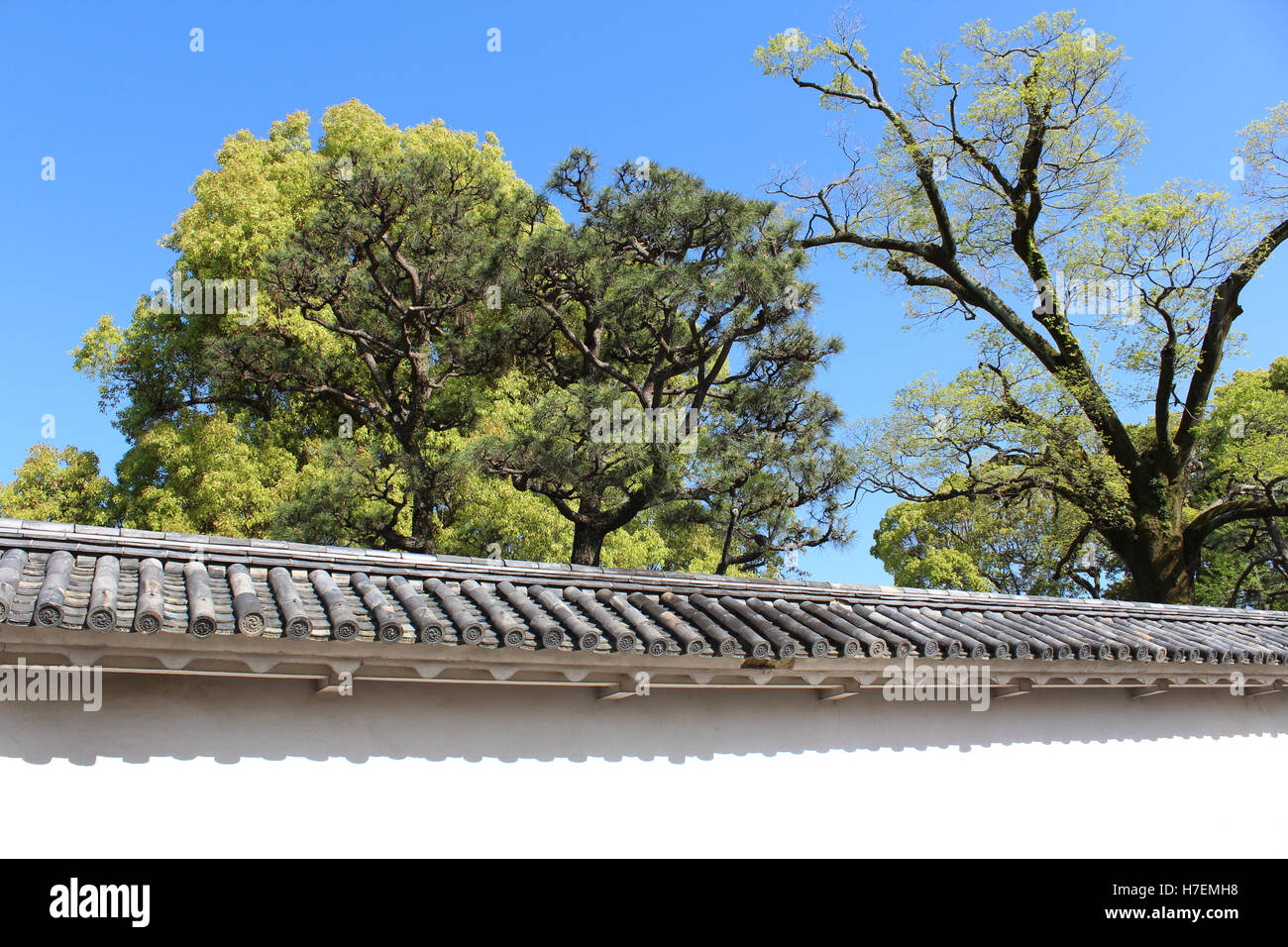Antique Japanese ceramic roof tile decorated with swirling comma