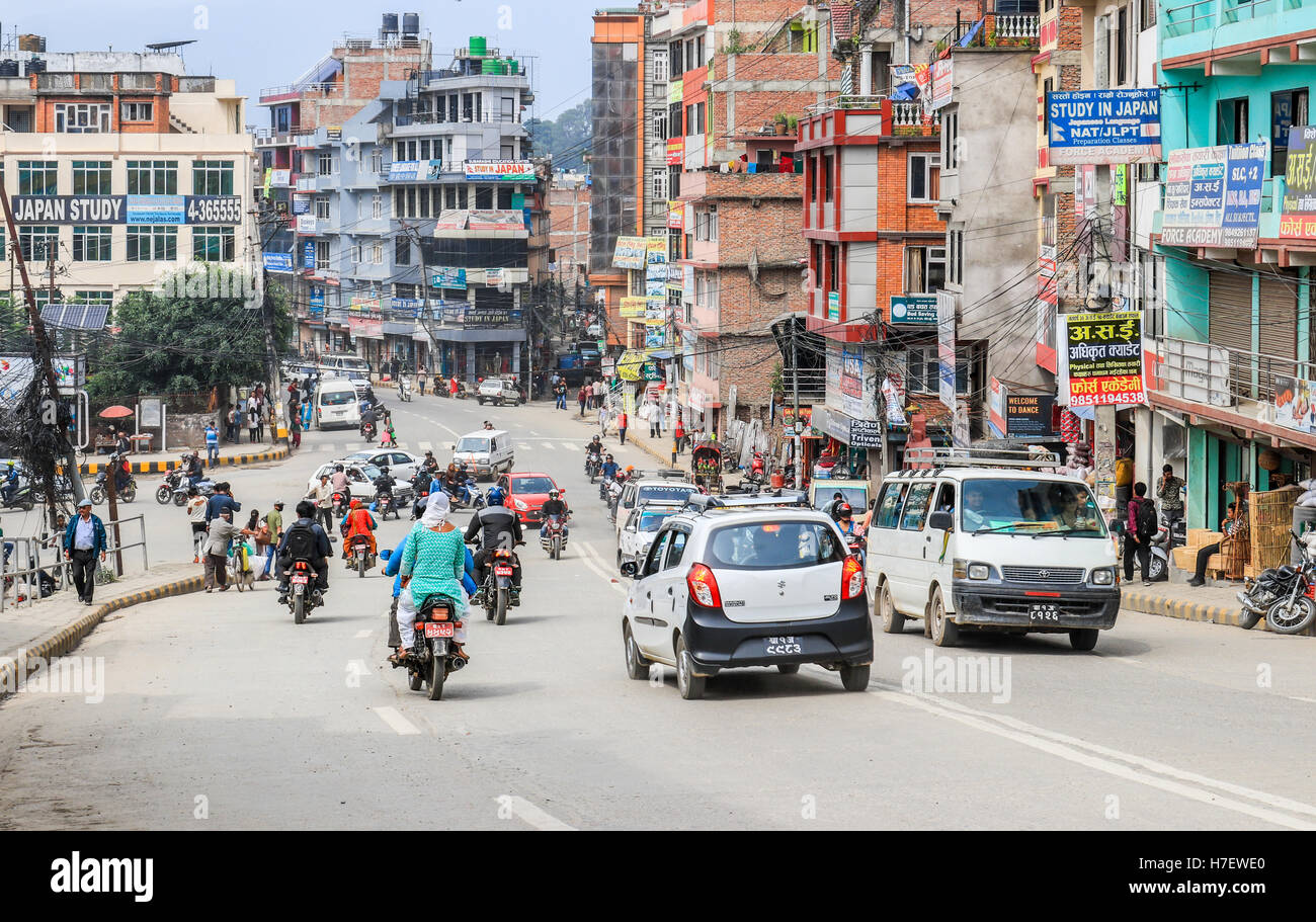 Traffic and pedestrians using main road in Kathmandu Nepal on a busy