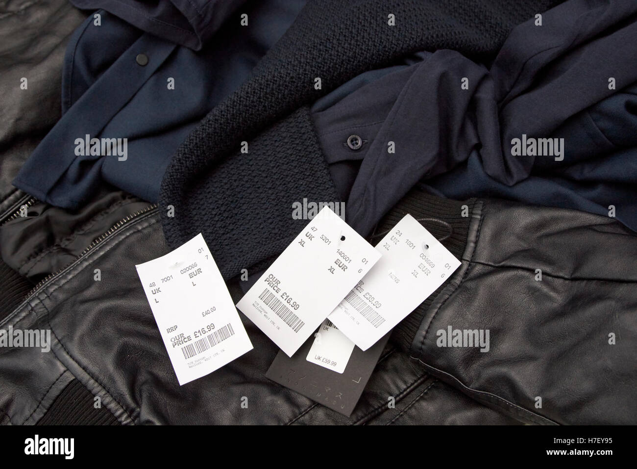 tkmax reduced price tags on mens clothing Stock Photo