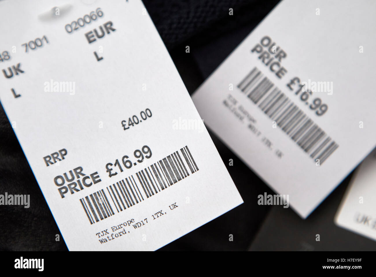 tkmax reduced price tags on mens clothing Stock Photo