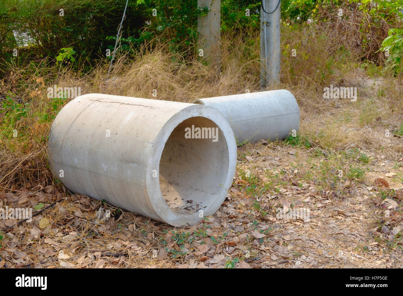 Concrete drainage pipes stacked for construction, irrigation, industry