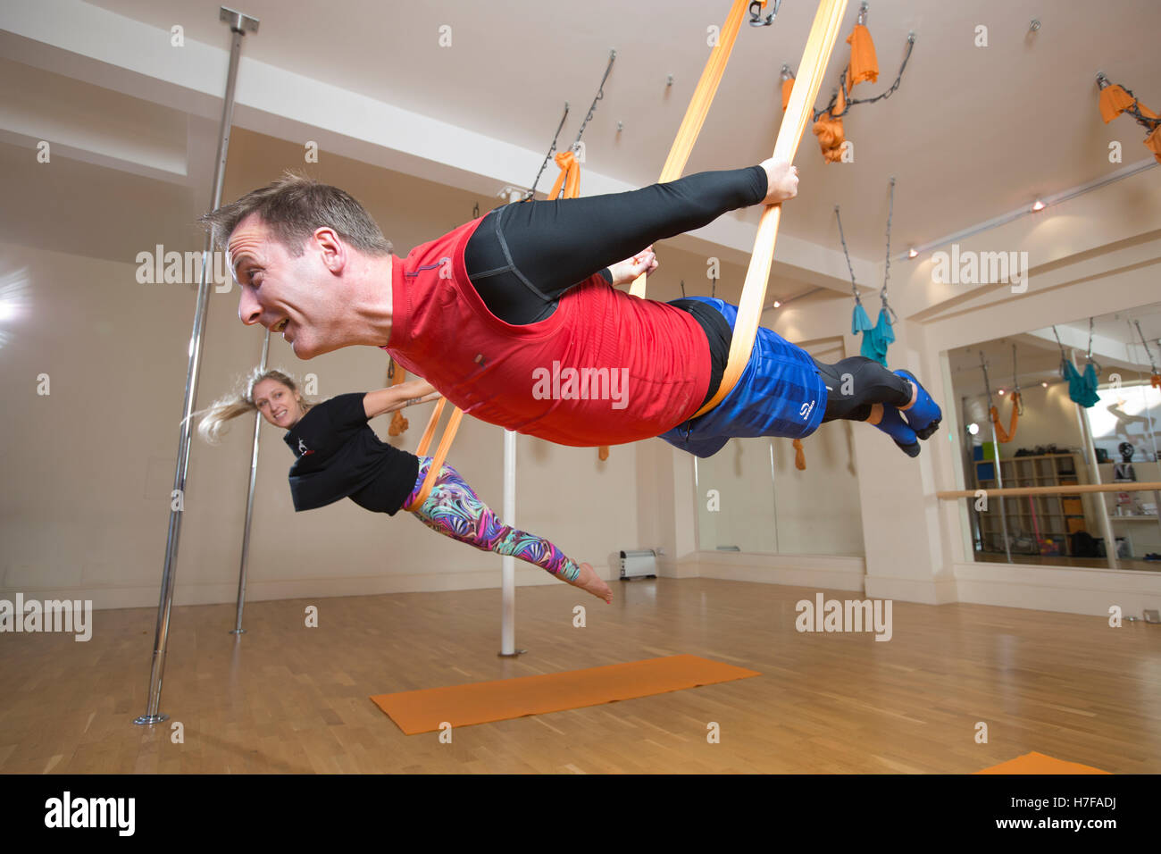 Aerial Yoga class, London, UK Stock Photo Alamy