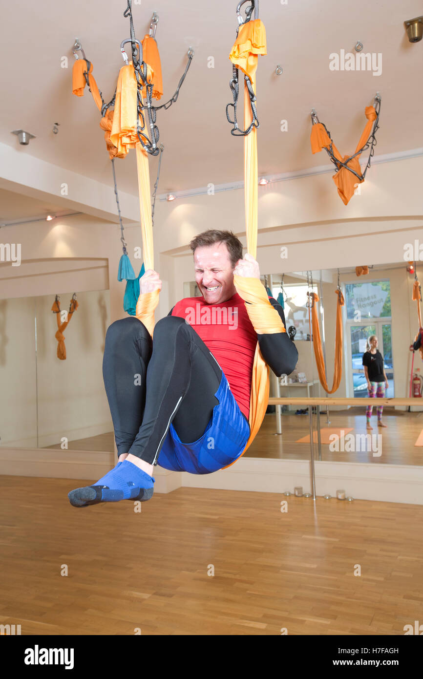 Aerial Yoga class, London, UK Stock Photo Alamy