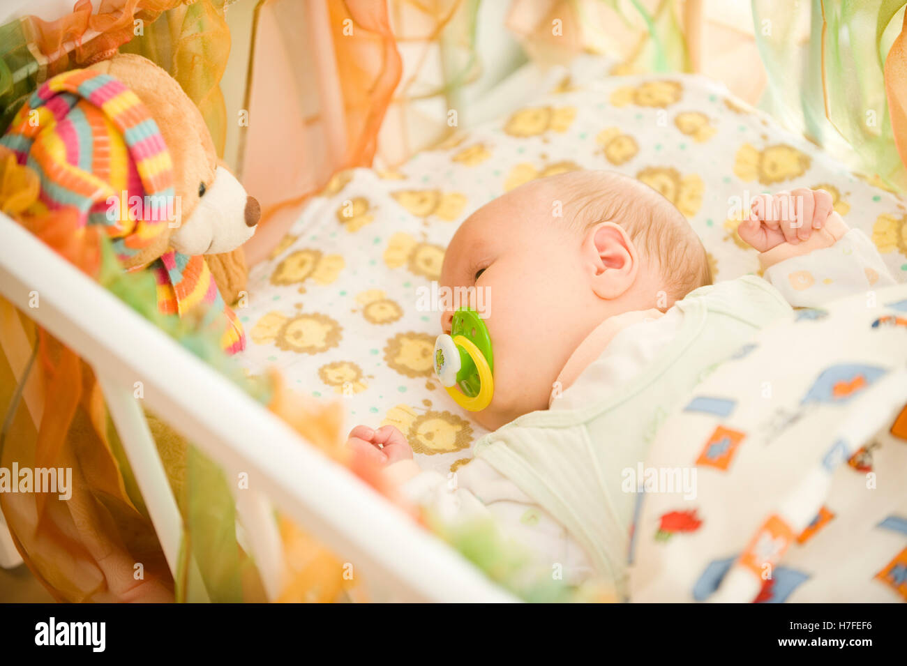 Baby in crib Stock Photo Alamy