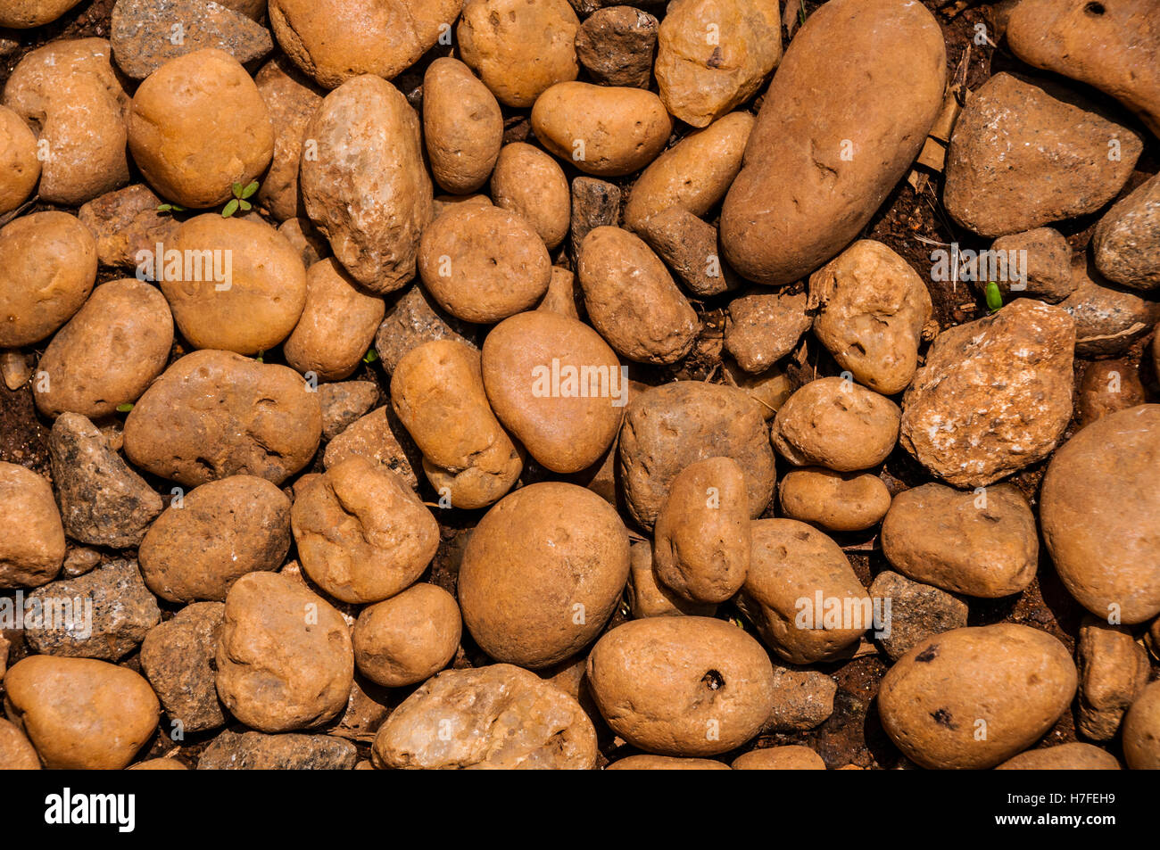 Pile, ocher stones, full-frame Stock Photo