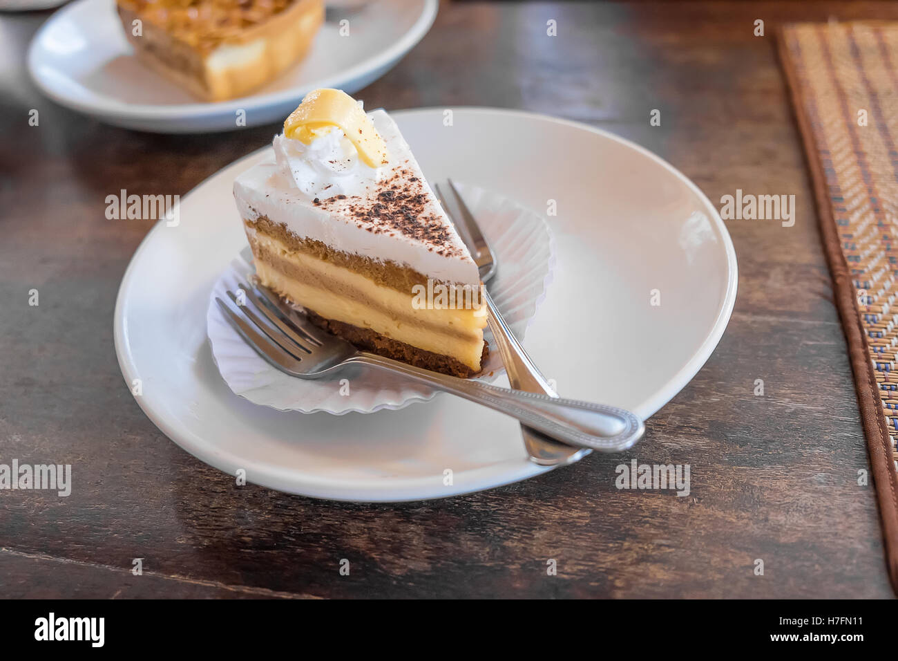 A Slice Of Tiramisu Cake On A Plate And Ready To Eat In Coffee Shop Stock Photo Alamy
