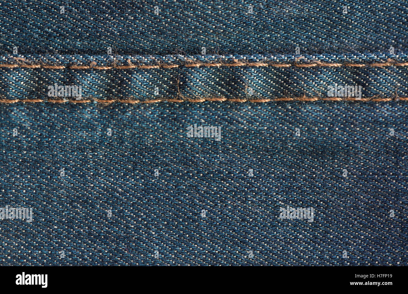 Blue denim jeans texture with seam, textile background Stock Photo - Alamy