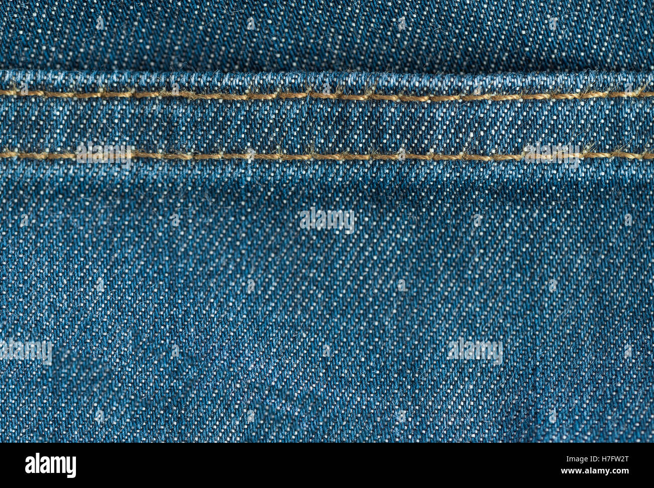 Blue denim jeans texture with seam, textile background Stock Photo - Alamy
