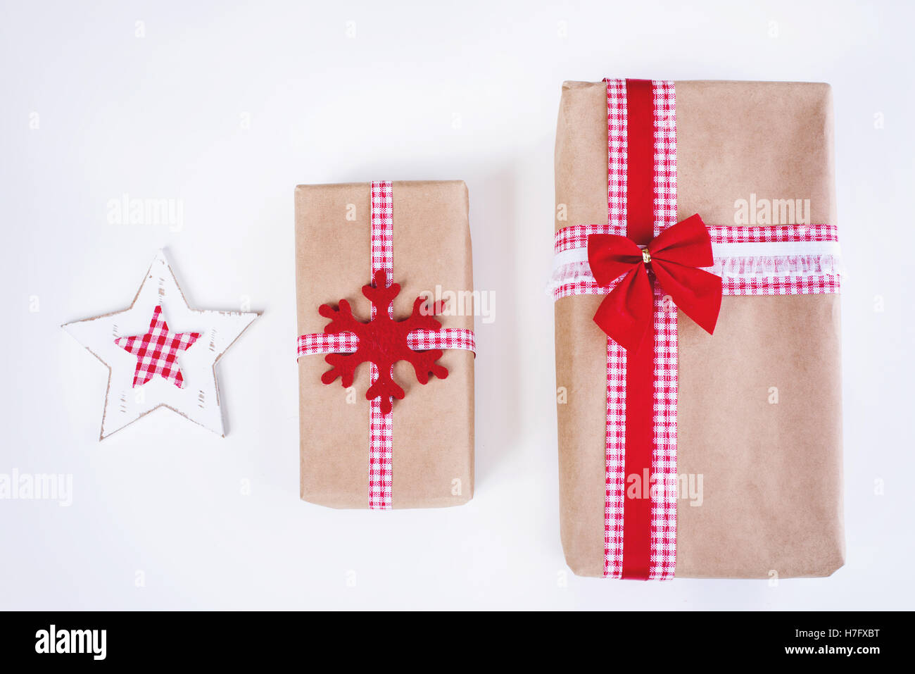Wrapped vintage gift boxes with red ribbon bow Stock Photo Alamy