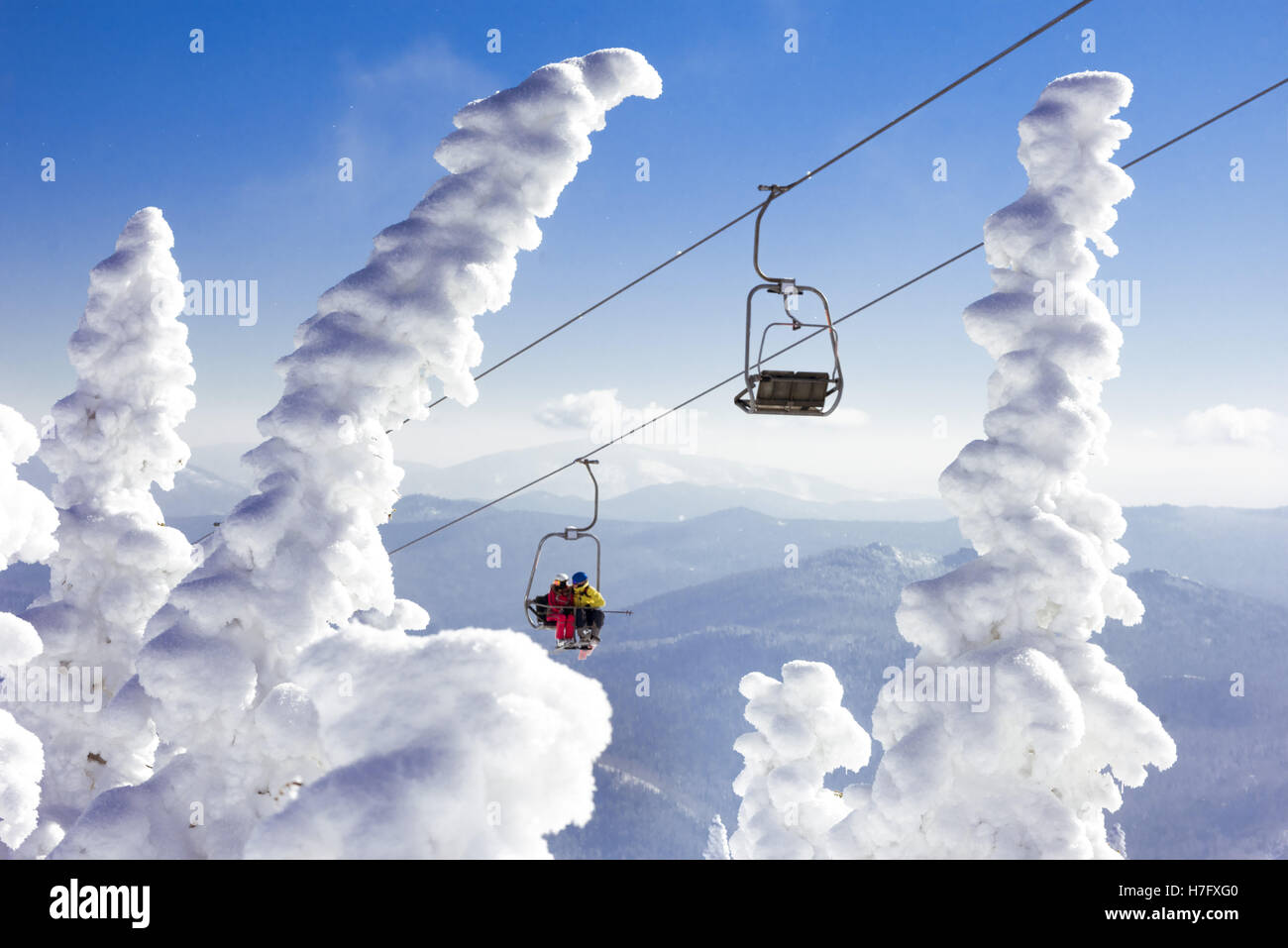 Ski lift at resort winter vacations Stock Photo