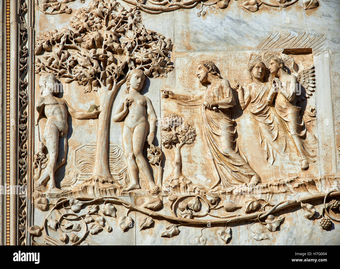Bas-relief of Eve and Adam 's fall by Maitani, circa1310, Tuscan Gothic,  facade Orvieto Duomo Cathedral, Umbria, Italy Stock Photo - Alamy
