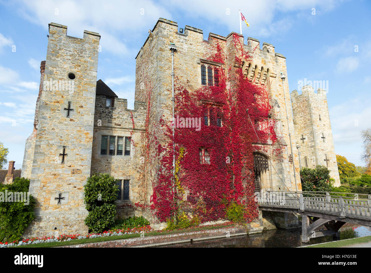 Hever Castle & moat, former home of Anne Boleyn, clad with red autumnal