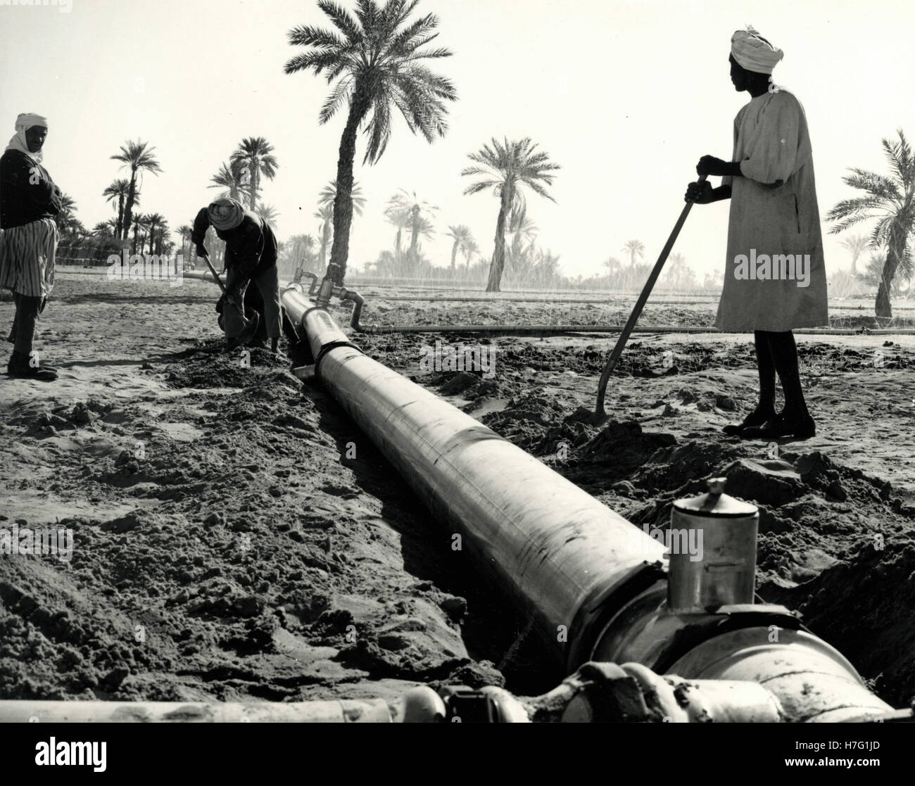 Men at work building the pipeline, Libya Stock Photo Alamy