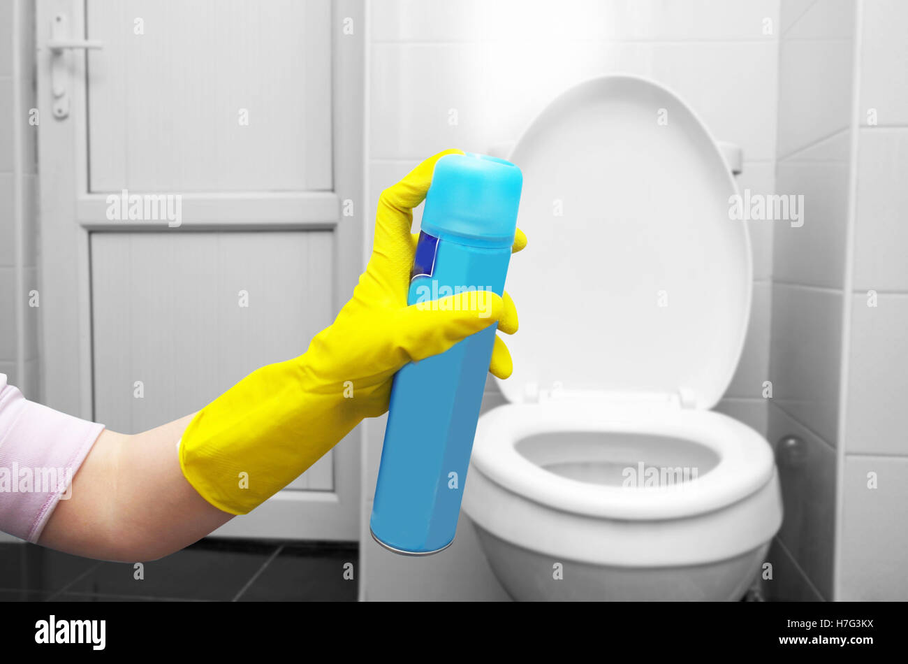 air freshner in hand in toilet Stock Photo Alamy