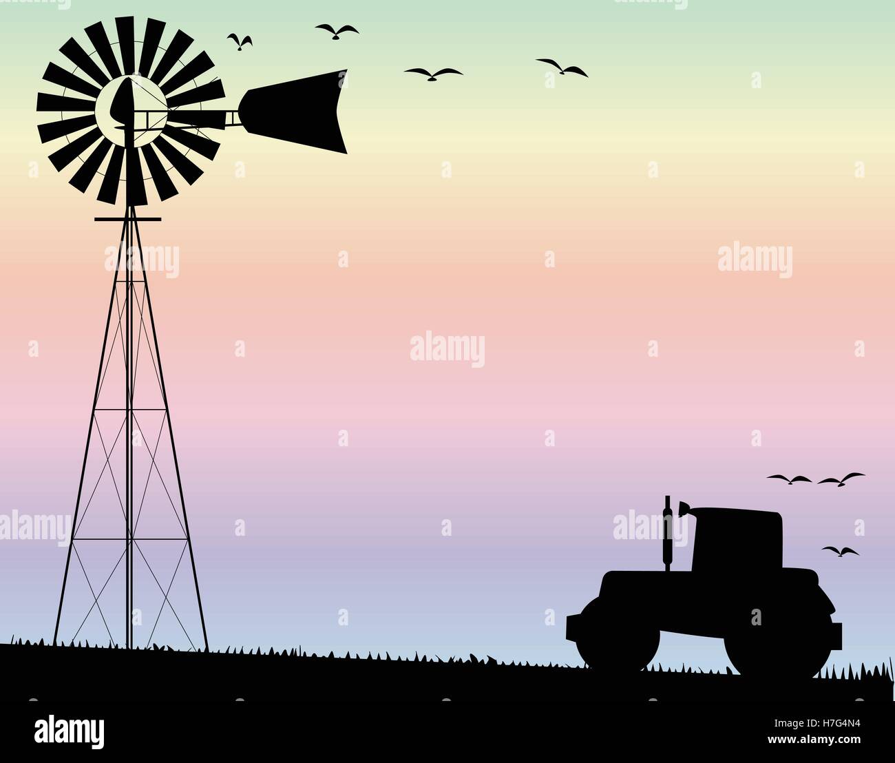 A small water pump windmill and a farm tractor silhouetted by sky Stock Vector
