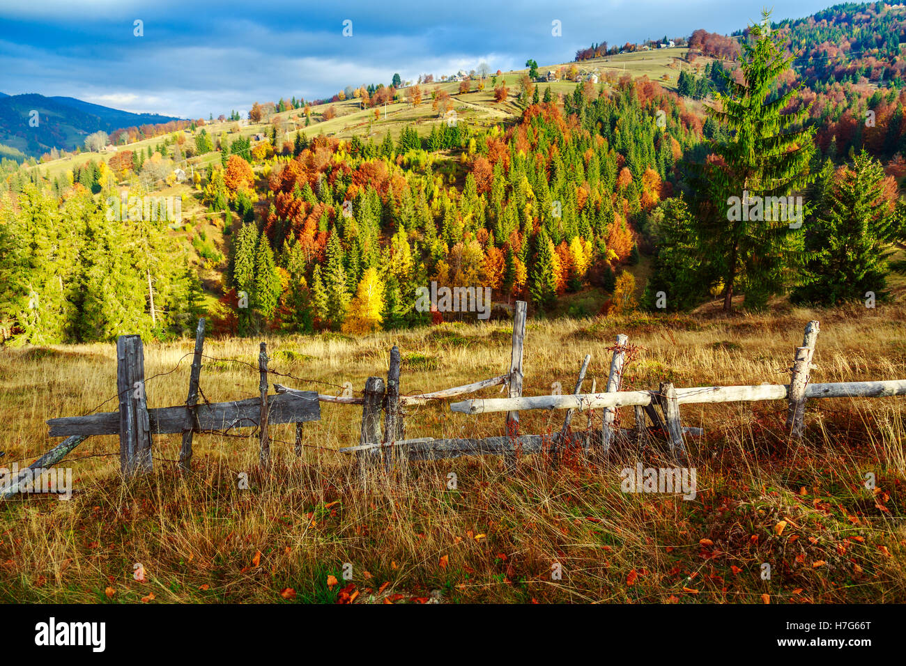 Colorful autumn landscape scene with fence in Transylvania mountain ...