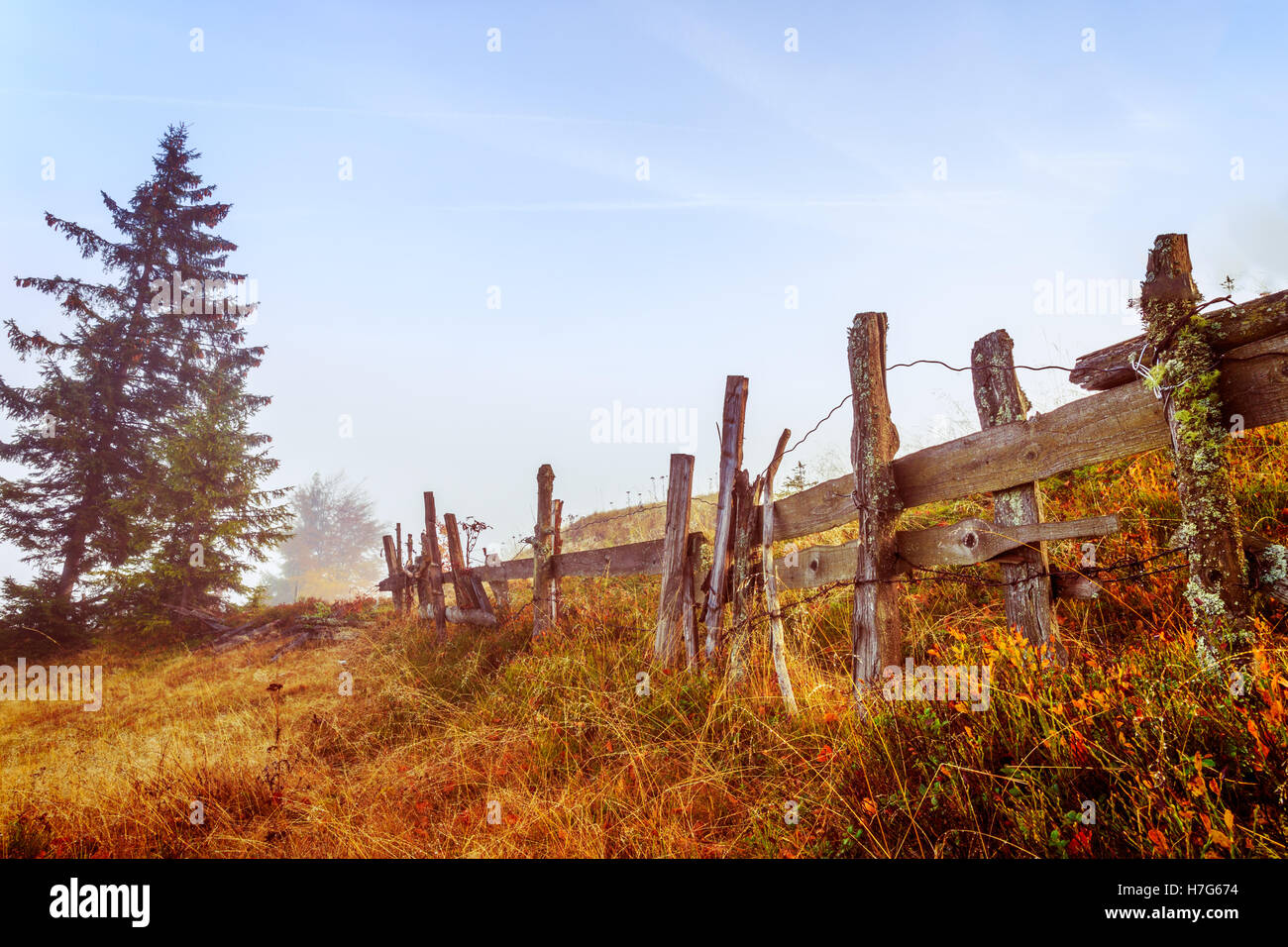 Colorful autumn landscape scene with fence in Transylvania mountain ...