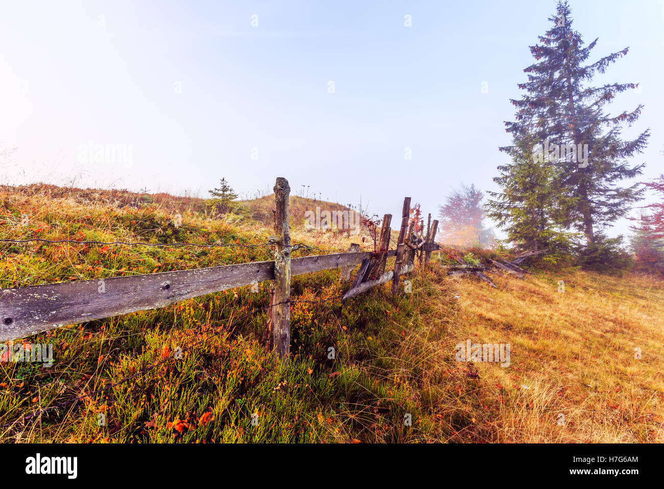 Colorful autumn landscape scene with fence in Transylvania mountain ...