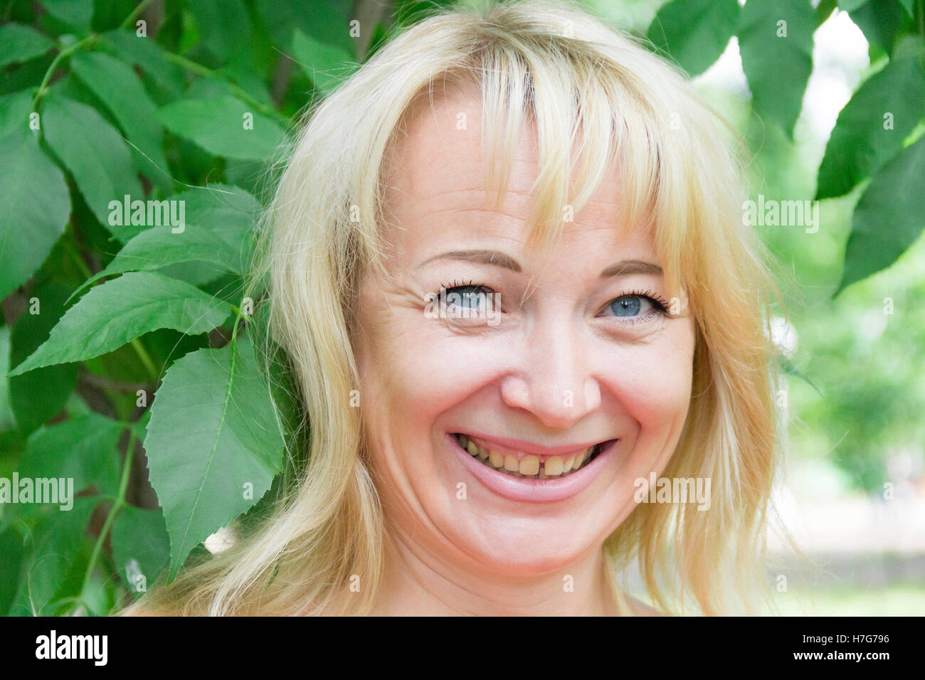 Blonde girl with blue eyes hi-res stock photography and images - Alamy