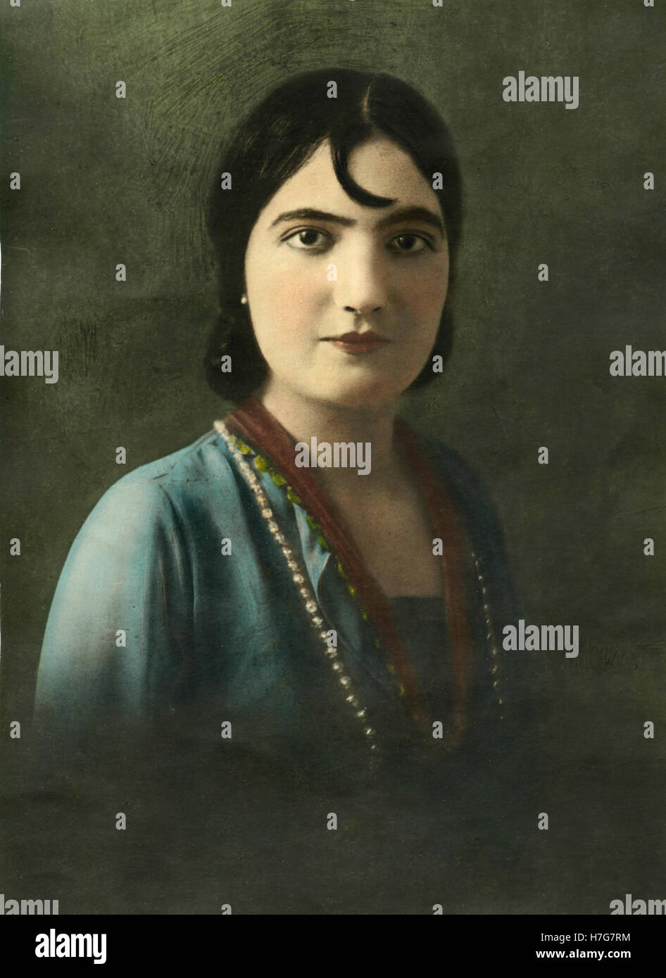 Hand-coloured portrait of a woman, Italy Stock Photo