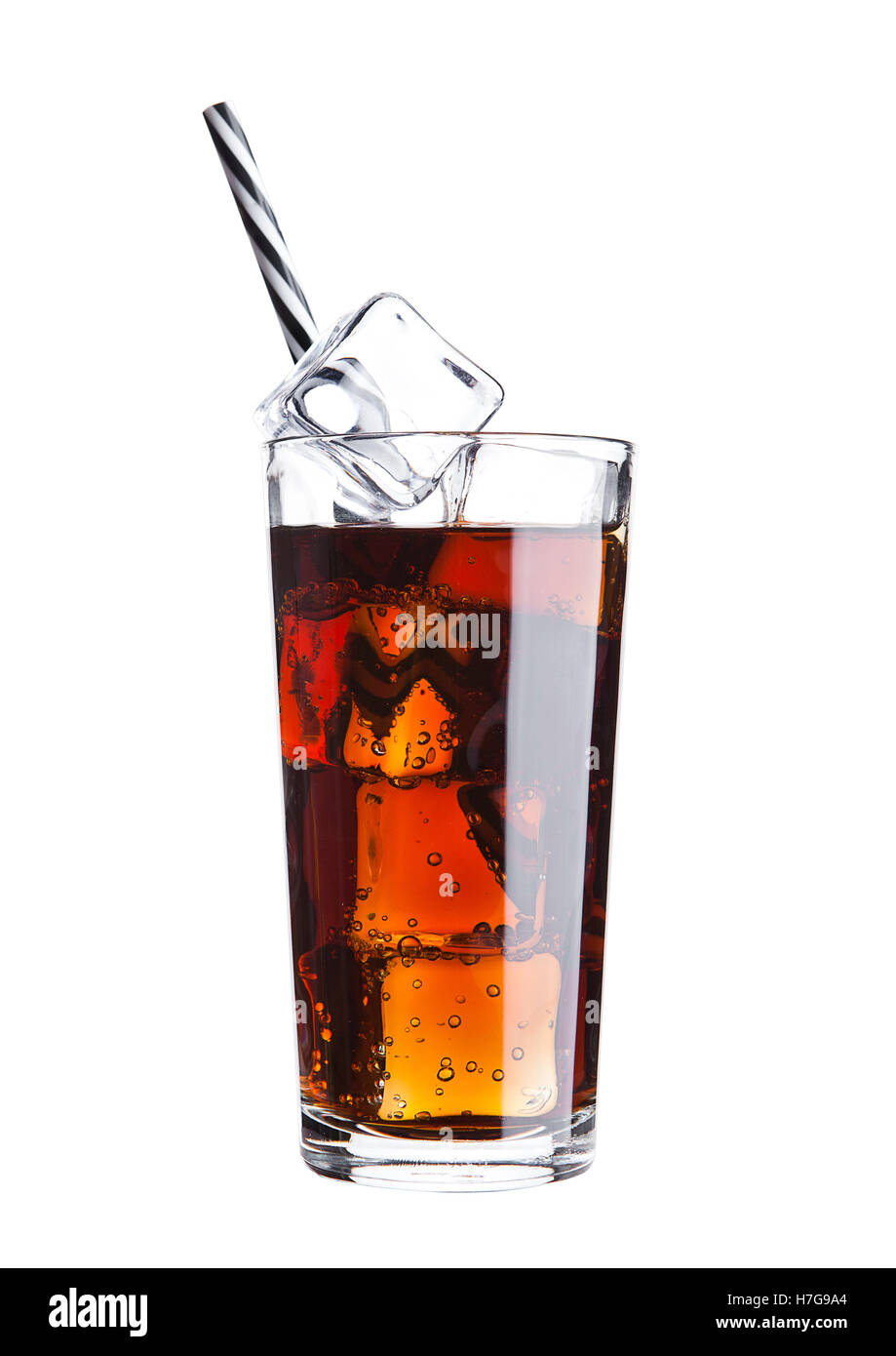 Glass of cola soda drink cold with ice cubes and straw on white ...