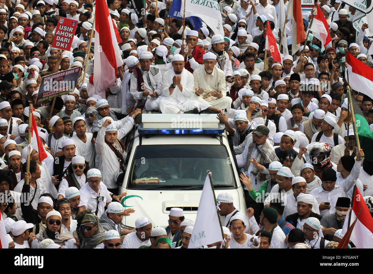 The leaders of moslem people alliances who are leads a huge rally to condemn the blasphemy of their religion in Jakarta. Stock Photo