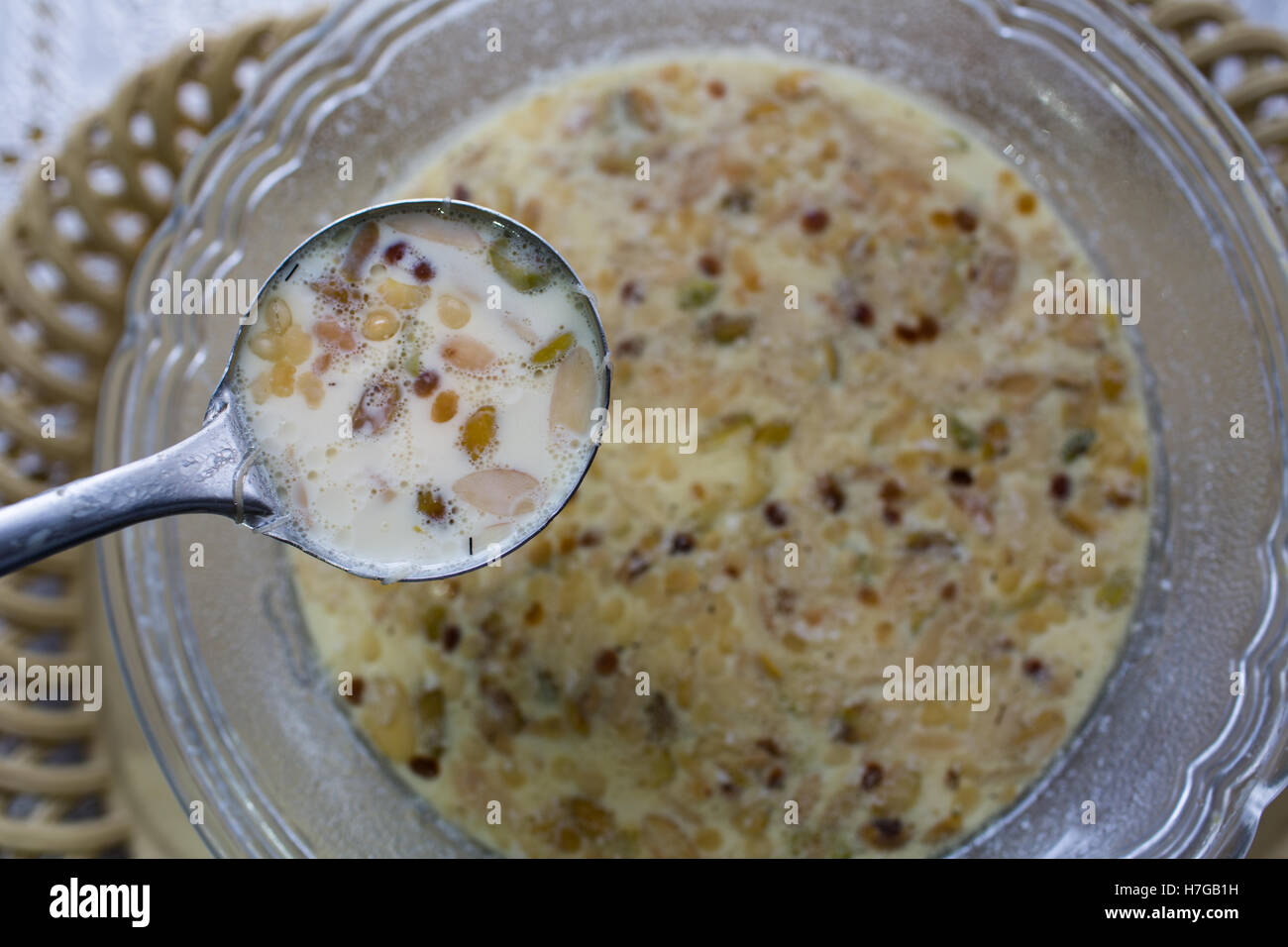 close-up shot of Sheer khurma ,a dessert prepared with vermicelli,Milk and Nuts during Eid in Hyderabad,India Stock Photo