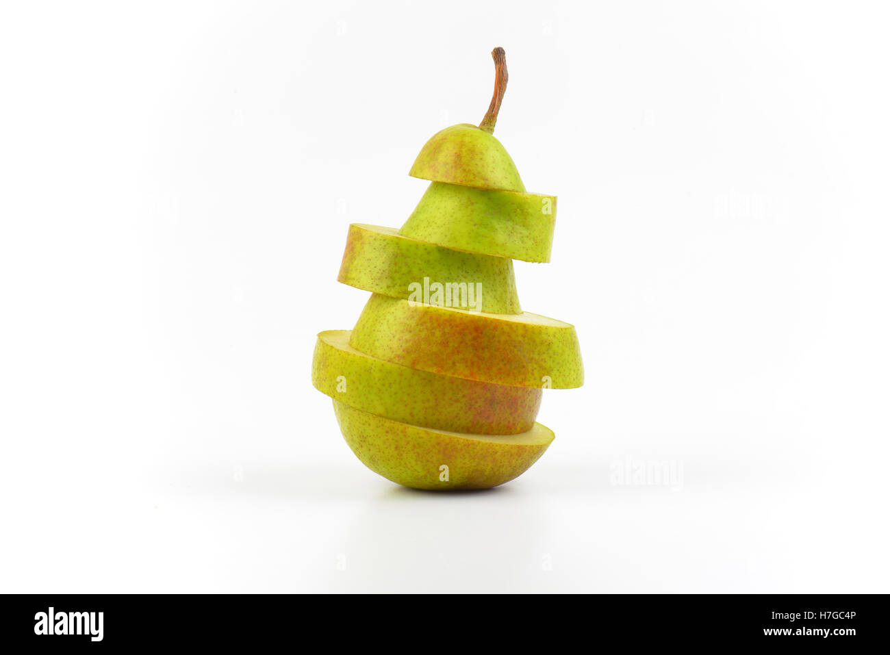 sliced ripe pear on white background Stock Photo - Alamy