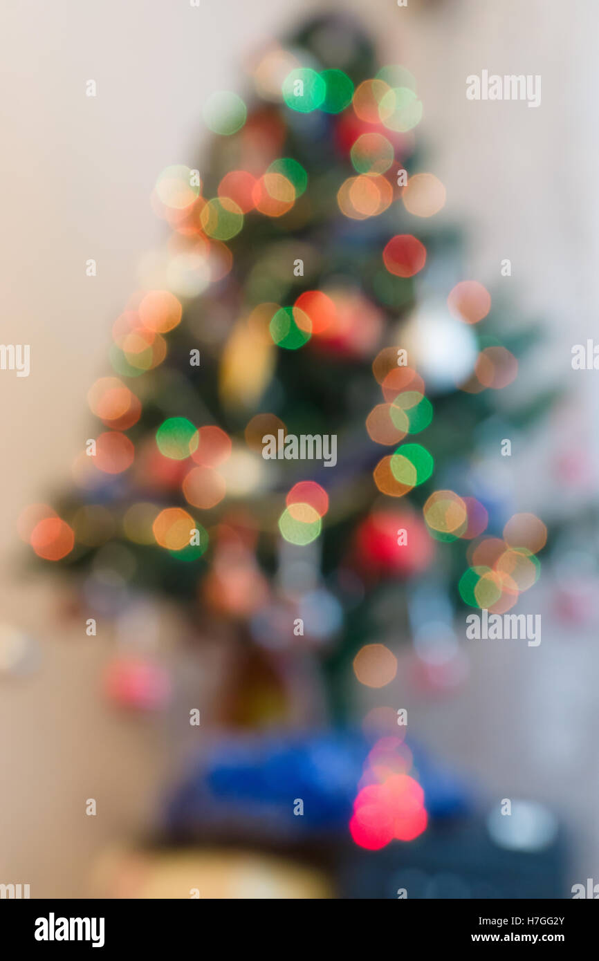 colorful Christmas decorations hung on the branches of trees Stock